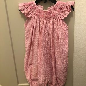 Pink seersucker smocked bubble romper